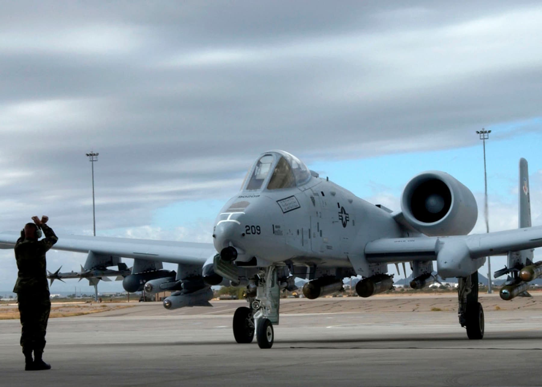 A newly modified A-10C Thunderbolt II taxis in during the roll-out ceremony Nov. 29 at Davis-Monthan Air Force Base, Ariz. The A-10 has been