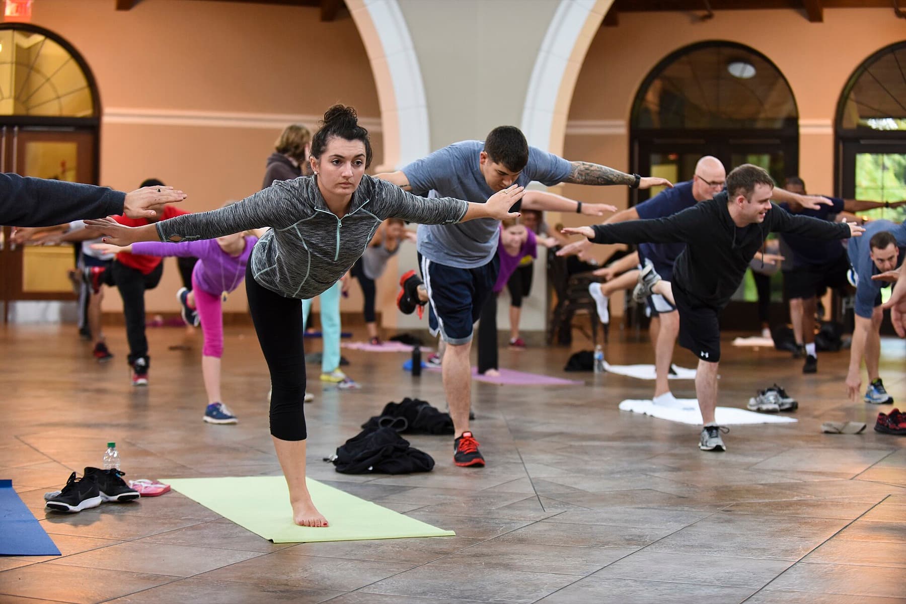 Brianne McMahon participates in yoga exercises during the USO of North Carolina Warrior Reset retreat, Nov