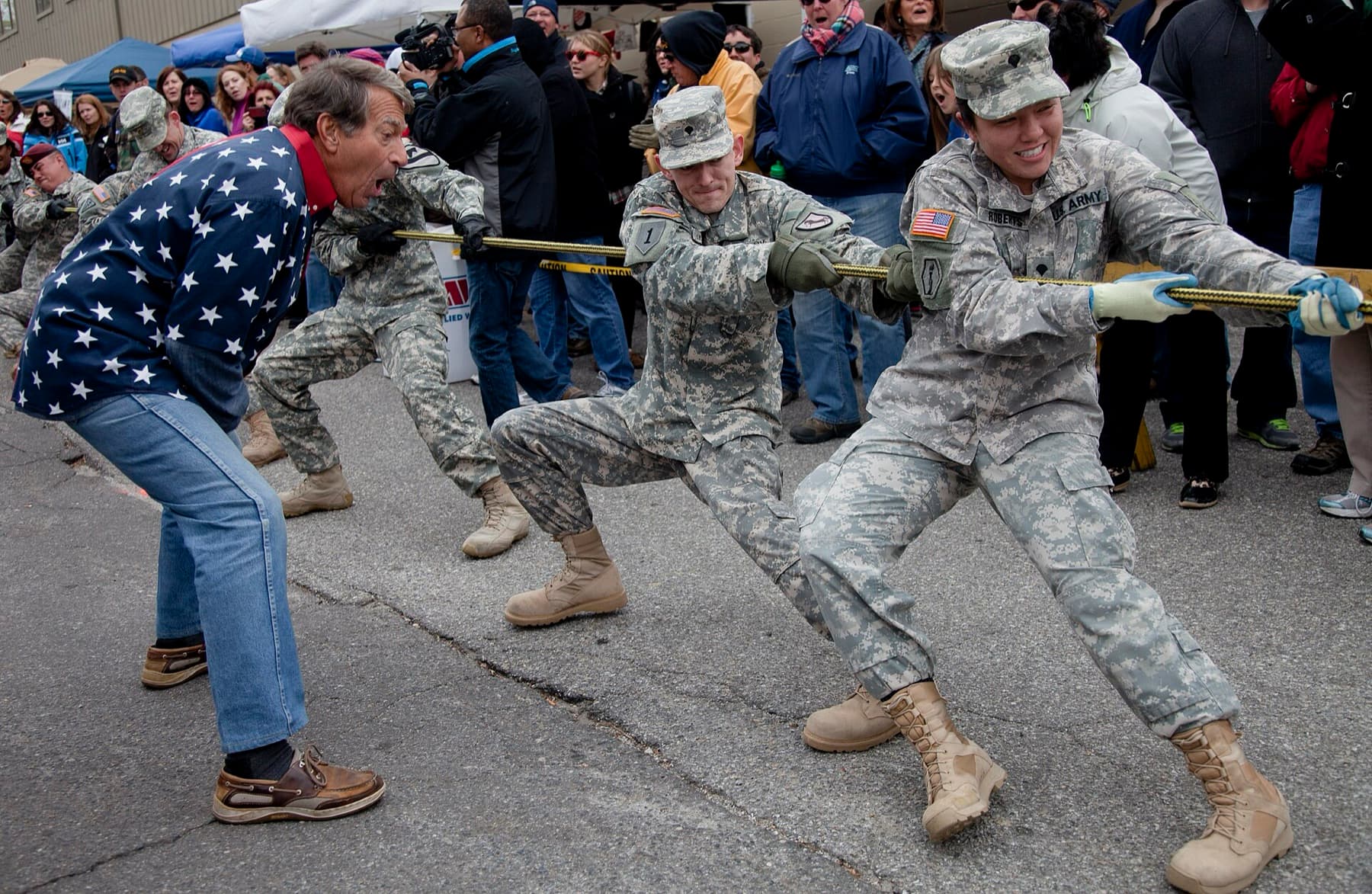 Coach Phil Stellar of Annapolis encourages Soldiers from Fort Meade during "Tug of War XV" on Saturday in Annapolis