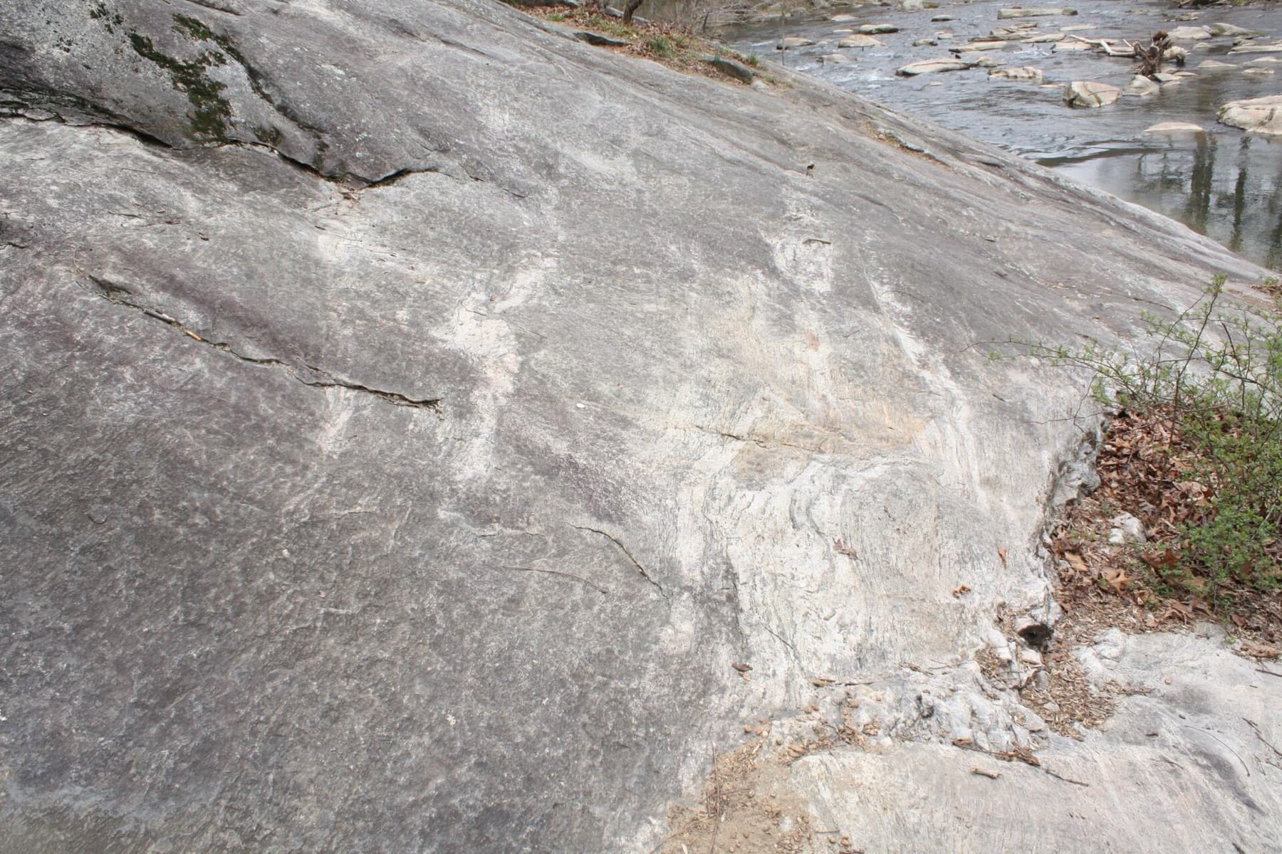 Large outcrop of Precambrian Baltimore Gneiss along the Patapsco River, McKeldin Area of Patapsco Valley State Park, Carroll County, Maryland