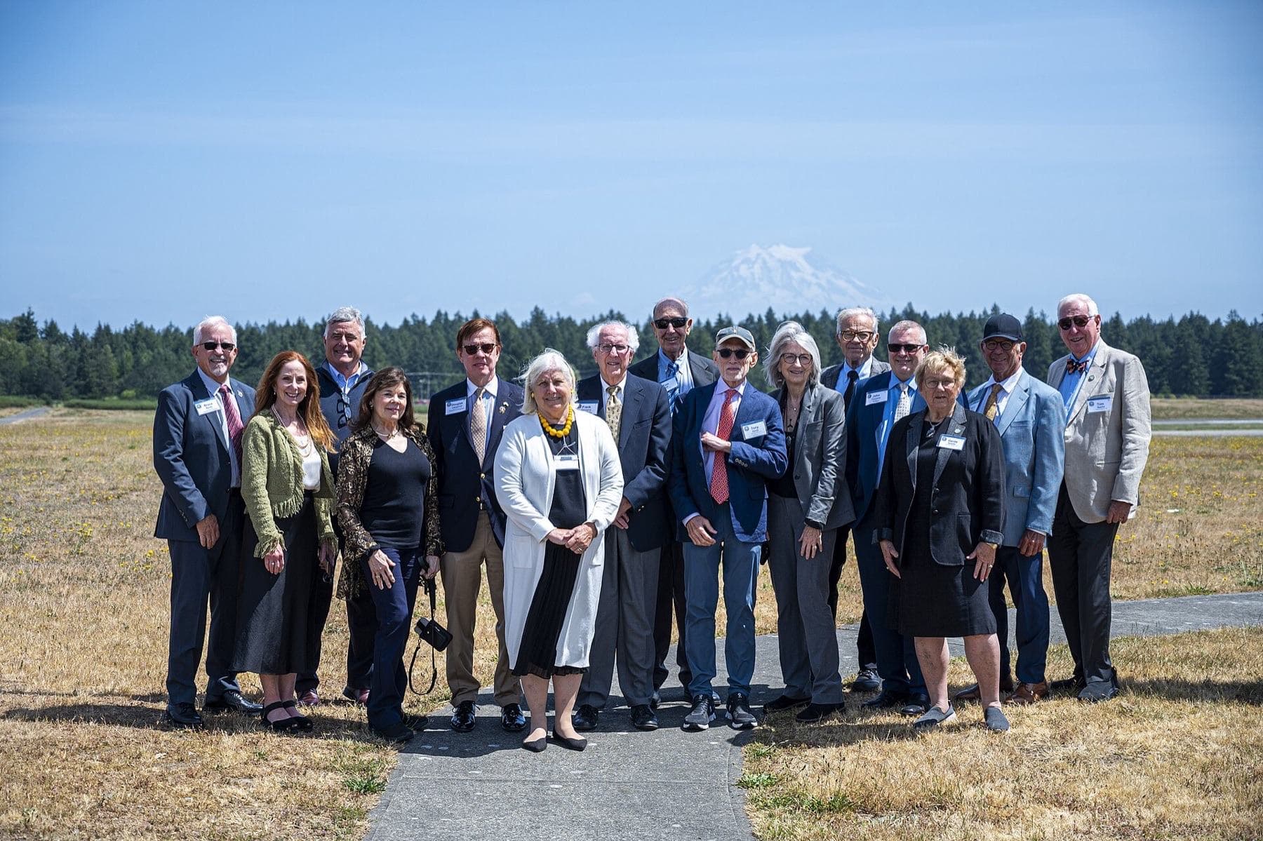 Members of the Defense Orientation Conference Association stand together on Heritage Hill at Joint Base Lewis-McChord, Washington, June 11, 2025