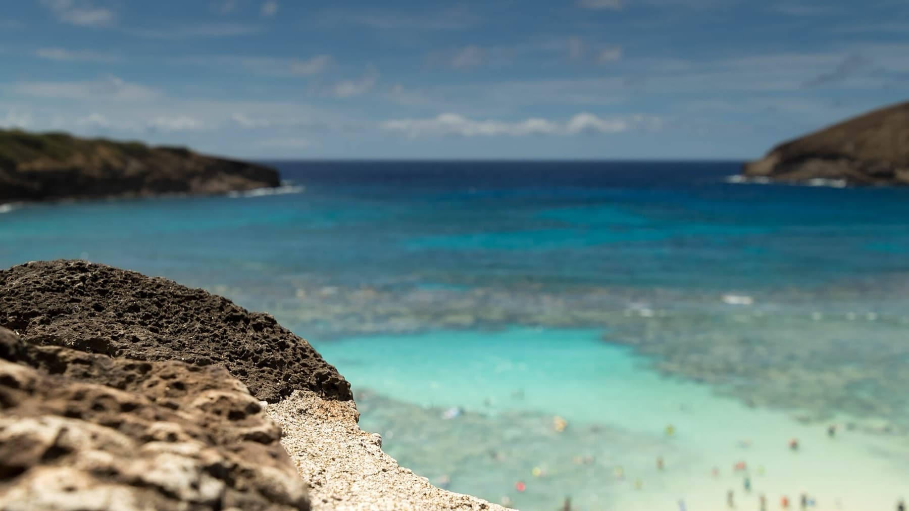 Oahu's Hanauma Bay is a Marine Nature Preserve created as the ocean eroded away the cone of an ancient volcano creating a perfect protective bay for coral and marine life to thrive