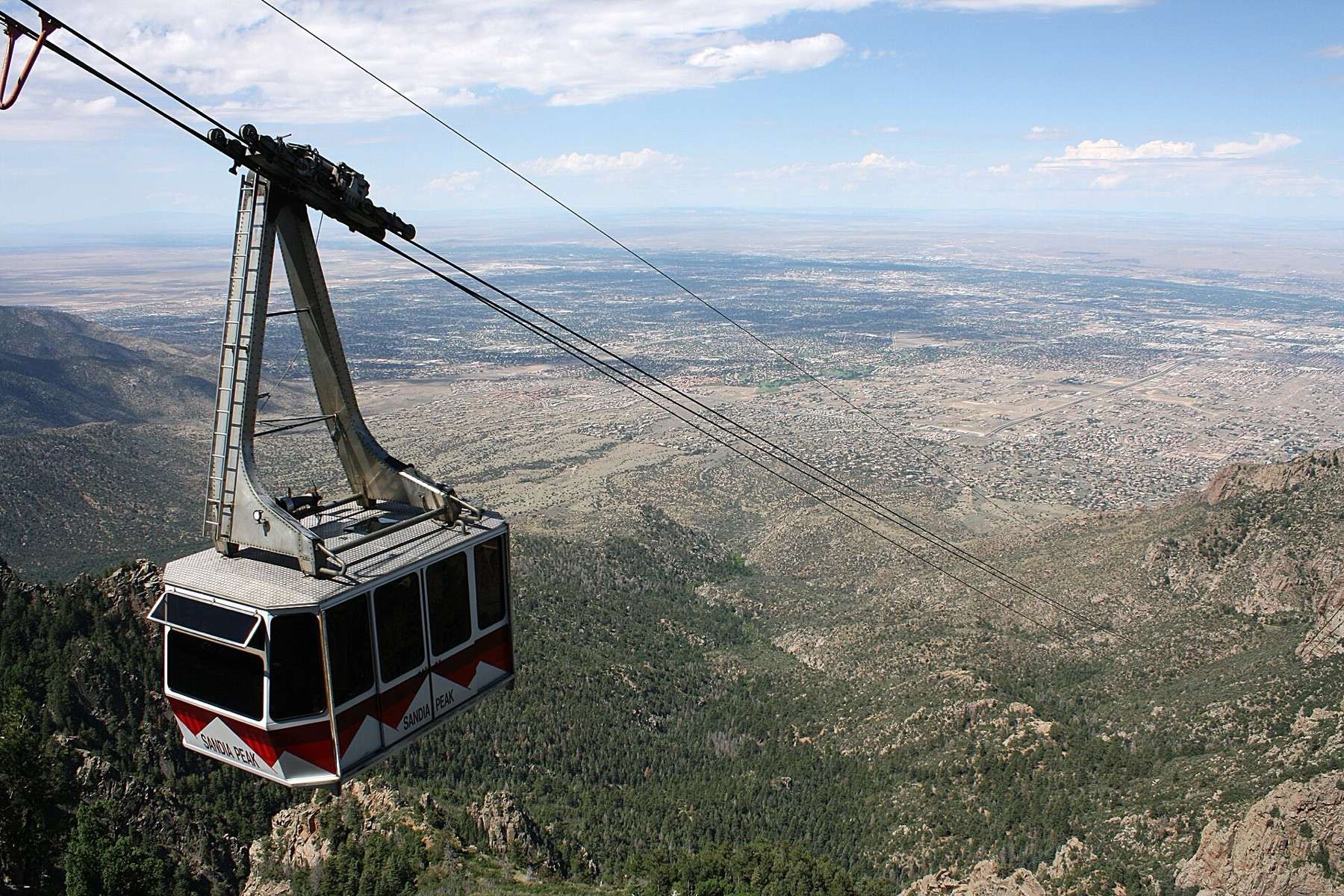 A Sandia Peak Tramway car high above Albuquerque