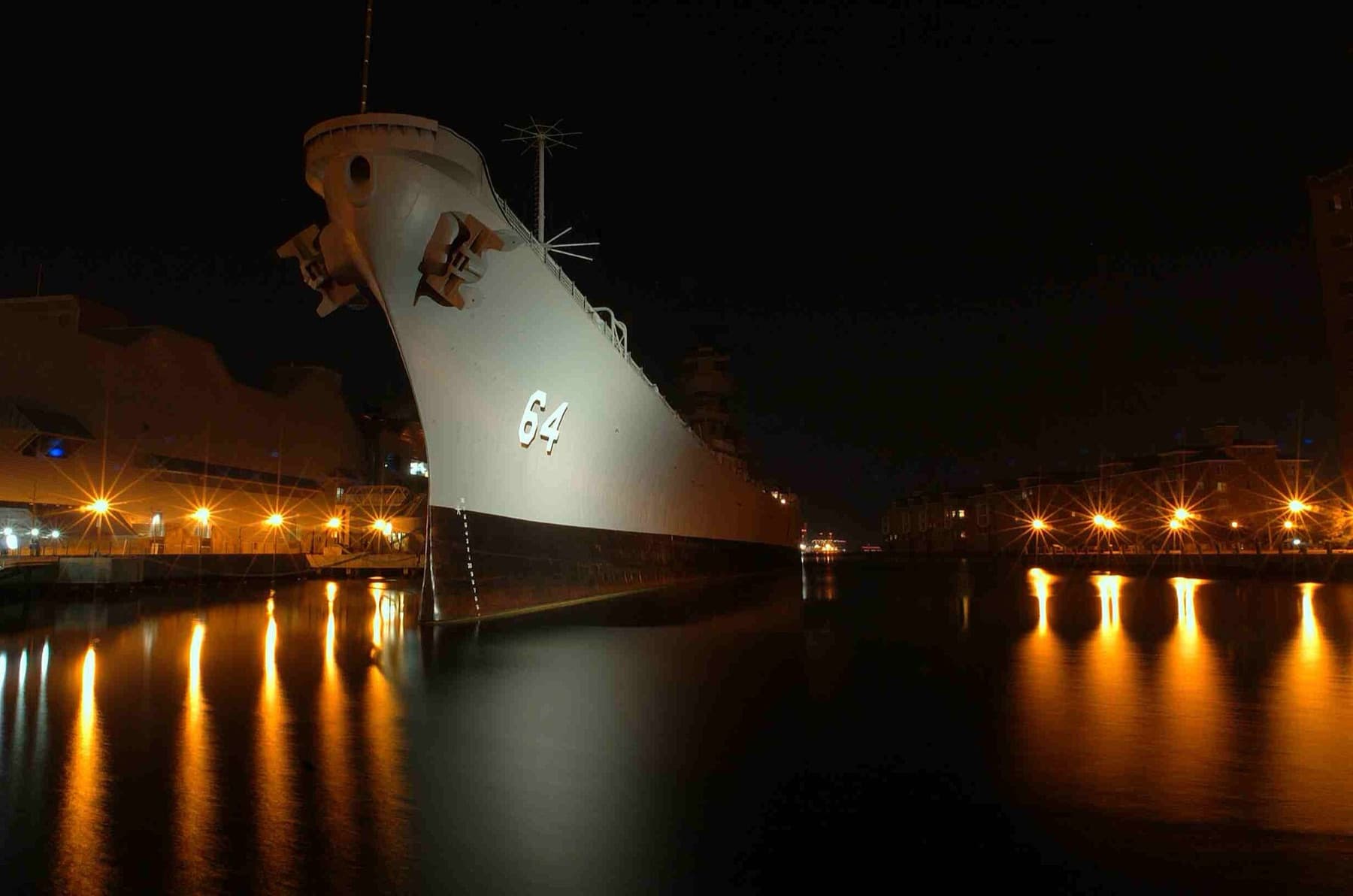 The battleship USS Wisconsin (BB 64) lies in its birth along the Elizabeth River at the maritime museum Nauticus, in downtown Norfolk, Va